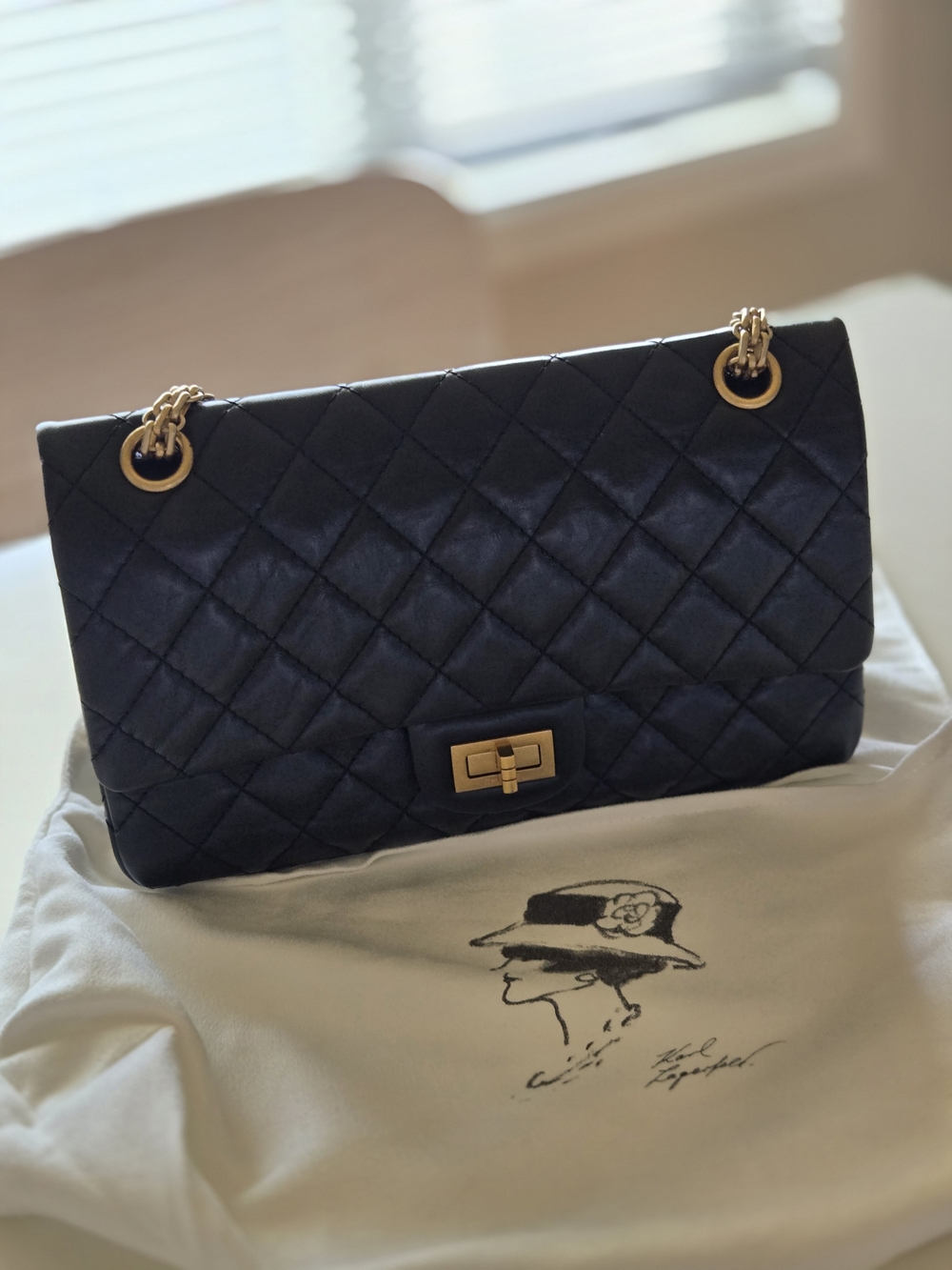 Chanel 2.55 Black Quilted Flap Bag with Gold Hardware